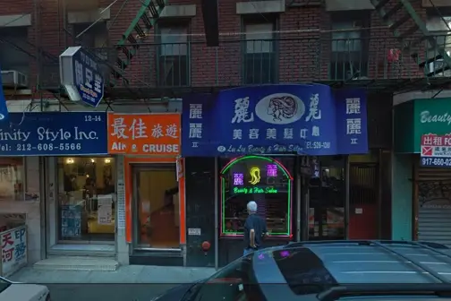 Pell Street between Bowery and Mott, where Cheng keeps her travel business